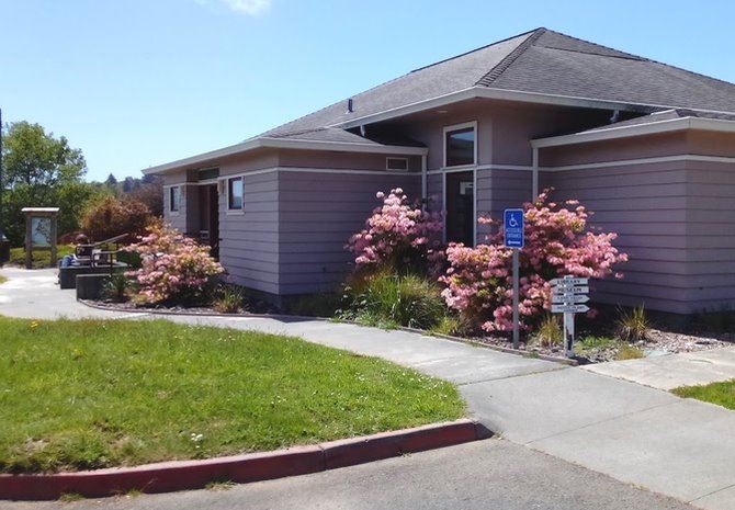 Trinidad Library, a one-story building in a park-like setting.