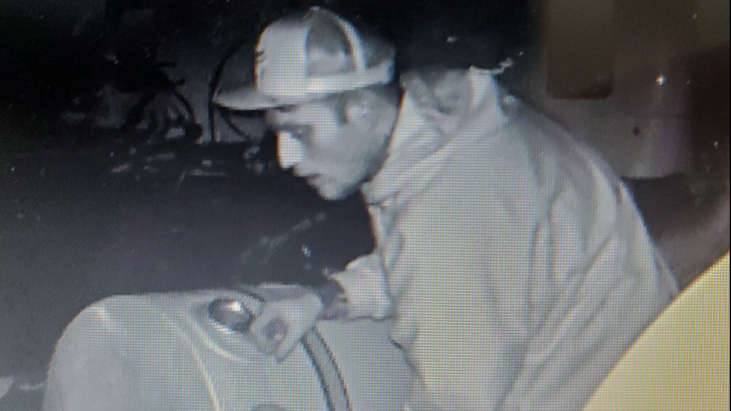 Male suspect stealing diesel