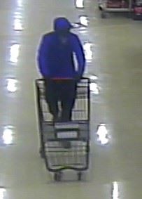 Suspect pushing a grocery cart