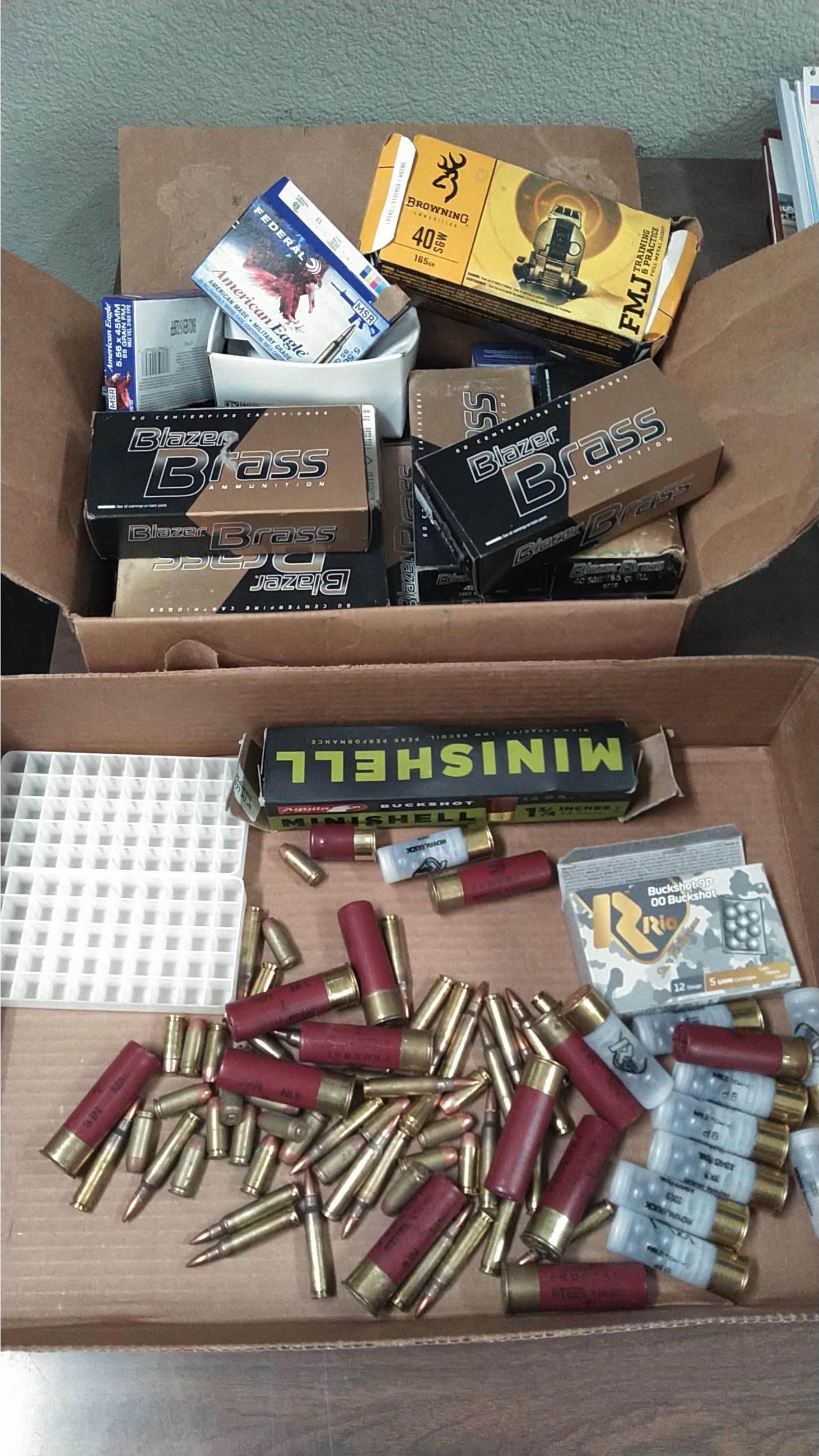 Multiple boxes of ammunition seized during search warrant