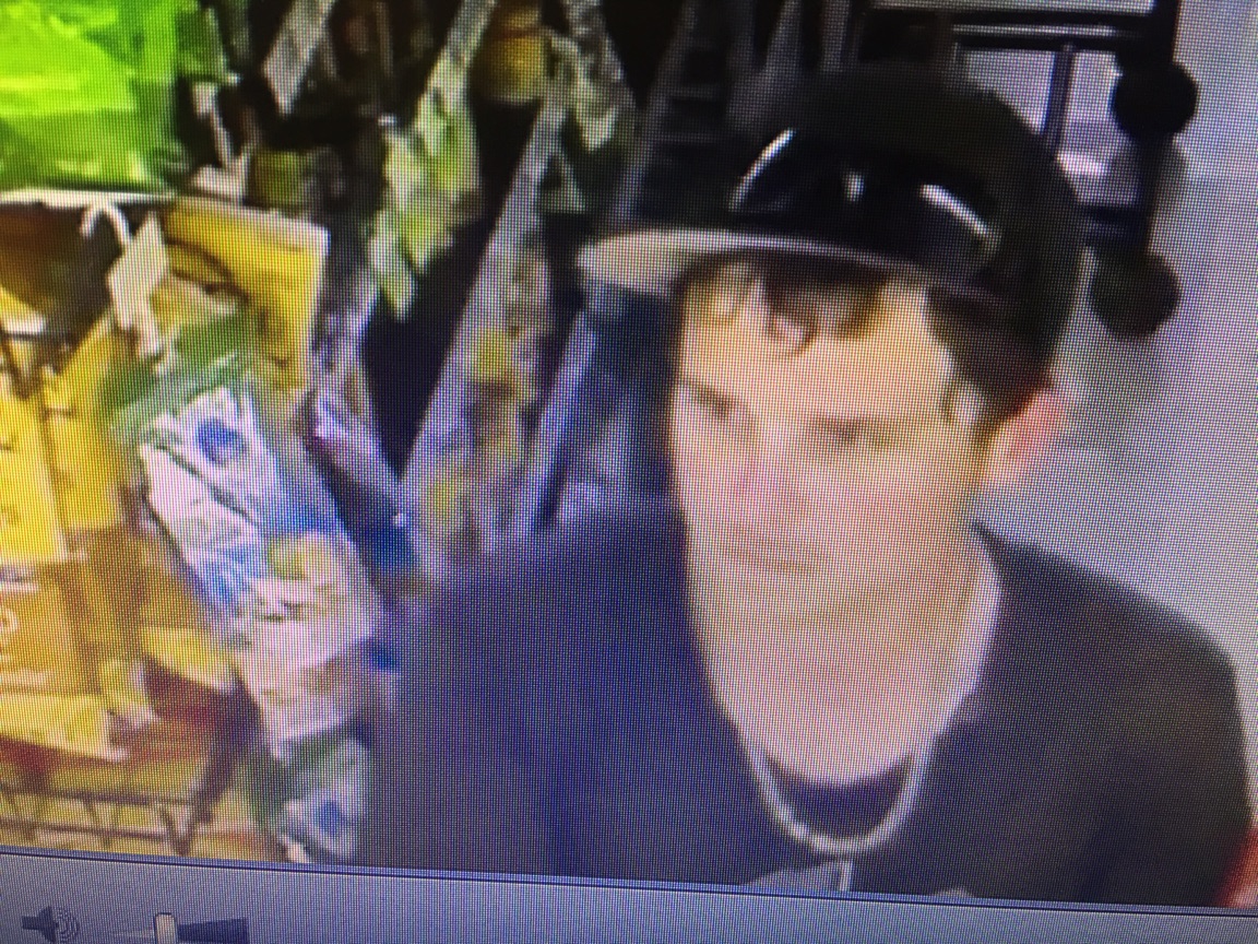 white male wearing a dark shirt