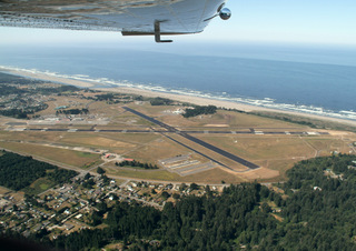 Plane flying over ACV